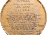 an old bronze medal with the names of people who died in the war