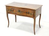 an old wooden table with a drawer on top of it