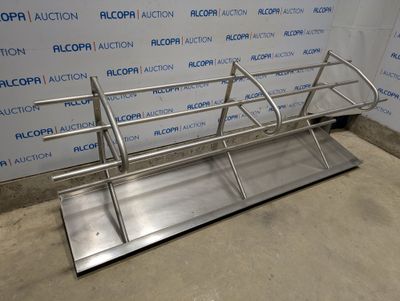 an image of a metal rack in a room with a wall behind it