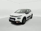 a white citrole is parked in a white room