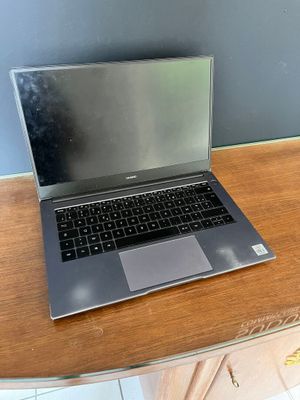 a laptop computer sitting on top of a wooden table