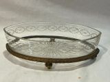 an image of a glass bowl with a handle on a white surface