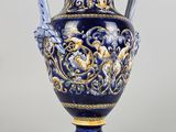 an image of a blue and gold vase on a white background
