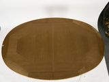 a wooden table with a round top on a white background