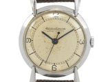 une image d'une montre-bracelet avec un bracelet en cuir marron