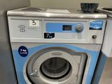 an image of a washing machine in a laundry room