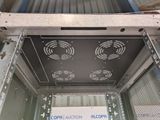 a picture of a metal structure with fan blades on it
