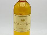 a bottle of wine that is sitting on a table