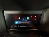 the dashboard of a car with a digital display on it