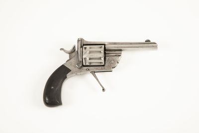 Curieux révolver à système à 12 coups et deux canons en tabl… - Photo 1