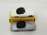 a toy car that is sitting on top of a box