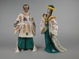 pair of chinese figurines of a woman and a man