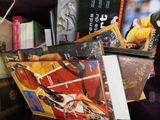 a lot of books that are sitting on a table