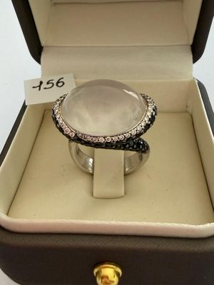 Bague en or gris, signée - KORLOFF - sertie d'un cabochon de…