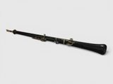 a black and gold clarinet on a white background