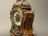 a clock that is sitting on top of a table