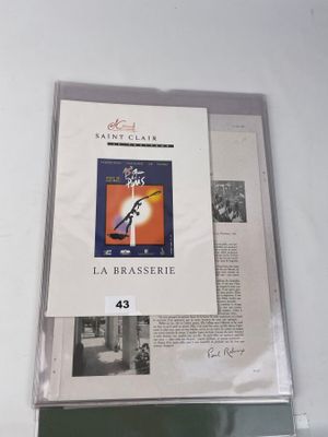 l'image d'une photo représentant un livre sur lequel figure l'image d'un oiseau
