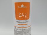 the bottle of sa2 is sitting on a white surface