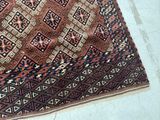 a rug with a pattern on it on the floor