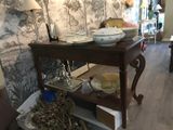 a table that has a bunch of dishes on it
