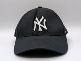 the new york yankees hat is black and white with a yankees logo on it