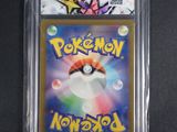 a close up of a pokemon card in a plastic case