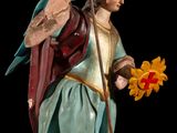 a statue of a man holding a flower and a staff