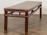 an image of a wooden bench sitting on top of a hard wood floor