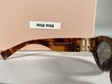 miu miu sunglasses in tortoise with gold details