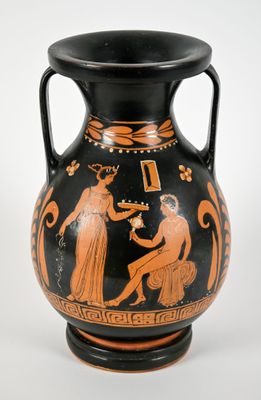 a black and orange vase with a painting on it