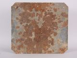 an old rusted metal plate on a white background