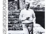 black and white photograph of a man walking up a set of stairs