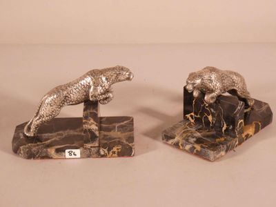 pair of silver plated animal bookends on marble bases
