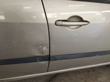 a close up of a car door handle on the side of the car