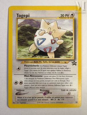 a close up of a pokemon card on a table