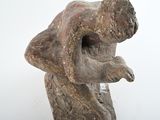 statue of a man holding a bird in his hand
