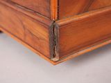 a close up of a piece of wood with a crack in it