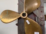 a propeller that is attached to the side of a building