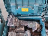 a blue tool box with tools in it on the floor