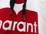 a red and white shirt with the word warrant on it
