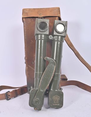 a brown bag with two binoculars on it and a brown strap