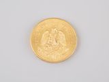 an image of a gold coin on a white surface