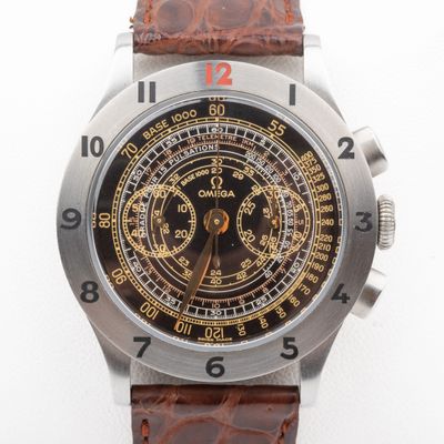 an image of a close up of a watch on a white surface