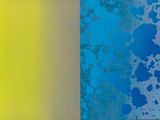 a blue and yellow painting on the wall next to a black and white picture