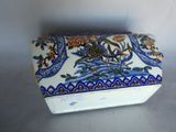 an image of a decorative box with birds and flowers on it