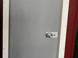 two doors that are next to each other on the wall
