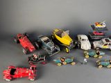 a lot of toy cars that are sitting on a table