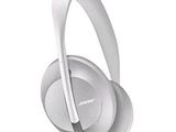 a pair of headphones sitting on top of each other on a white surface