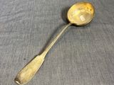 a spoon that is sitting on a table