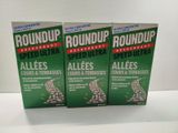 three boxes of roundup insect repellent on a table